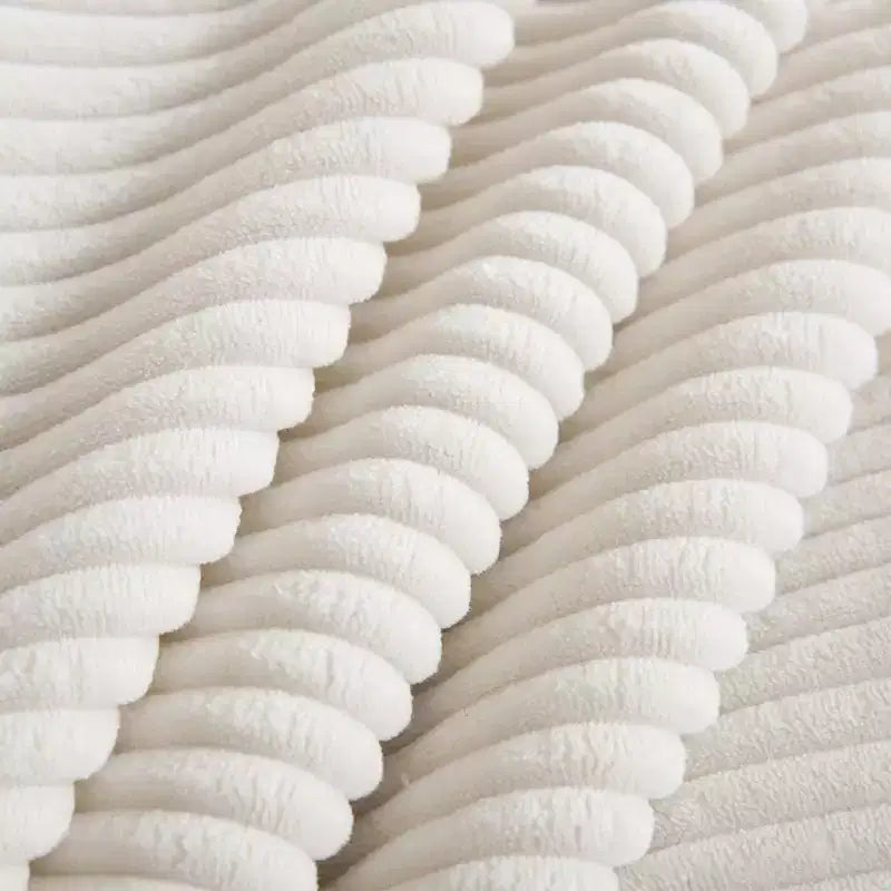 Divano componibile a L in velluto a coste con pouf contenitore e 4 cuscini decorativi